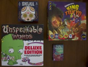 Skull, Unspeakable Words, King of Tokyo, and Get the MacGuffin are all great tabletop games to teach to new gamers.